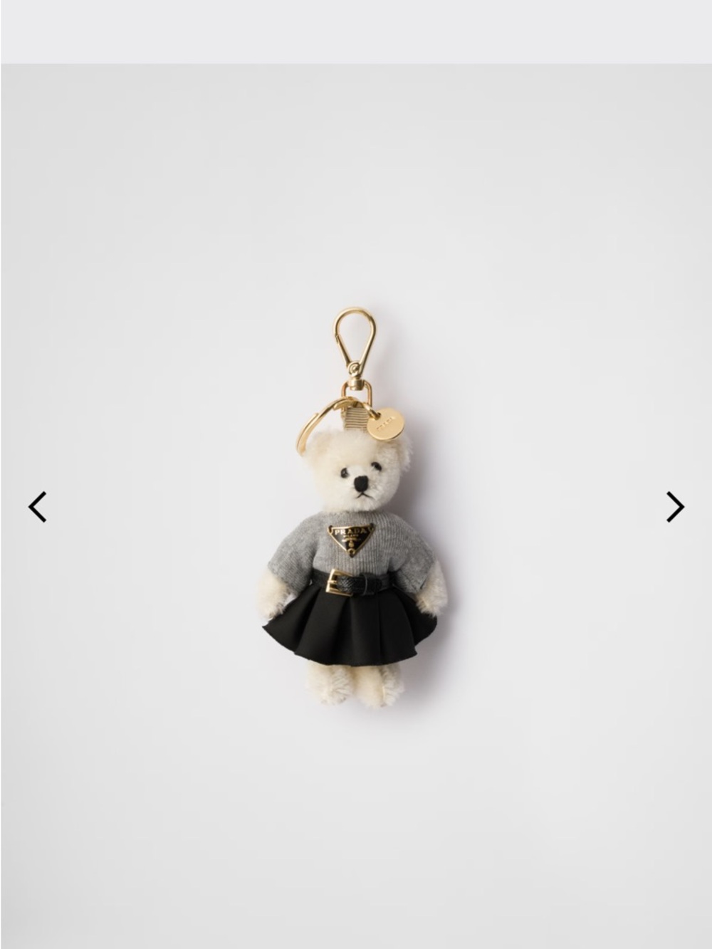 Prada Teddy Bear Keychain in Gray Sweater & Black Skirt with Gold Hardware